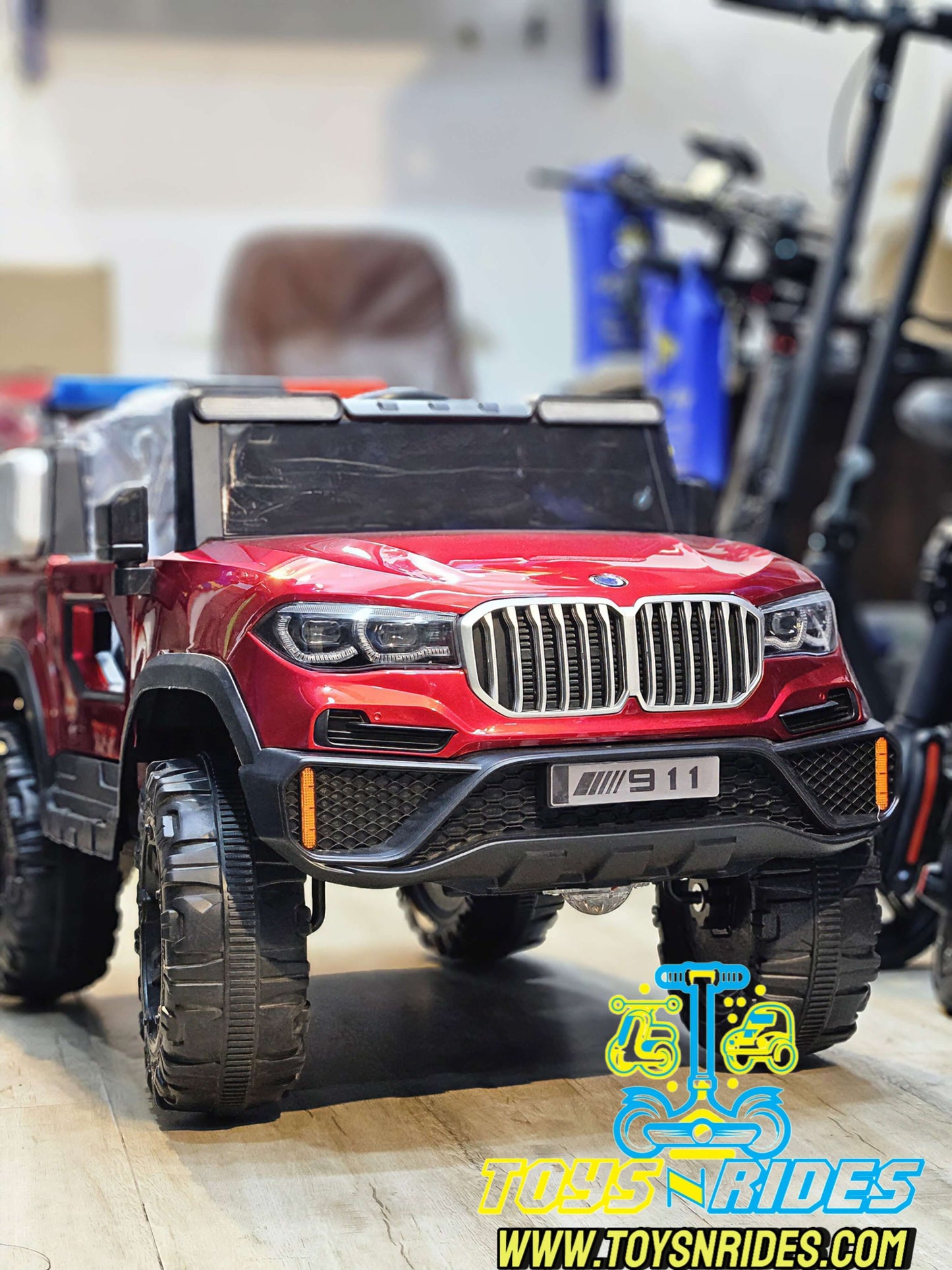 BMW-shaped 4WD battery jeep for kids on rough terrain