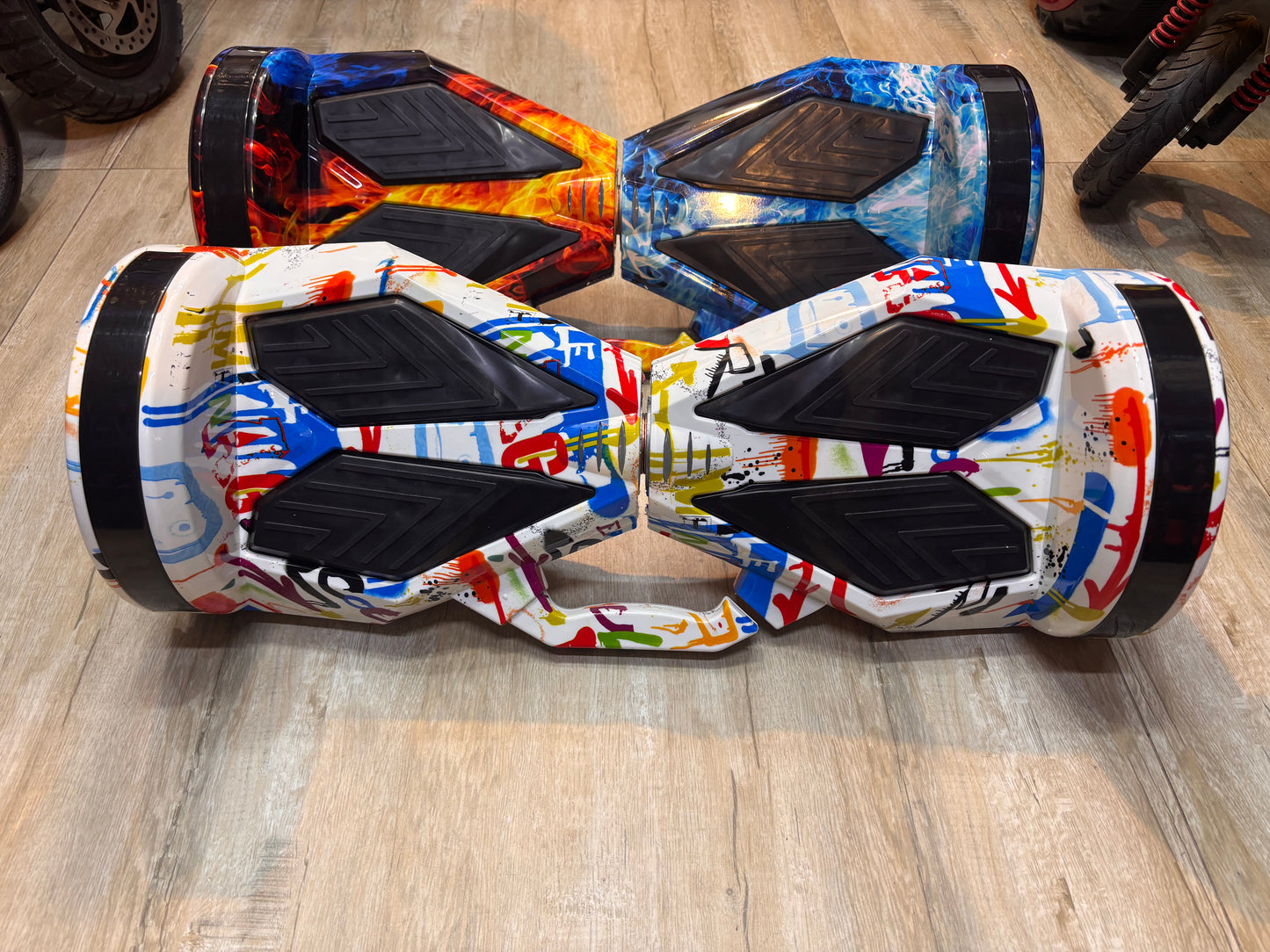 Close-up of the TOYSNRIDES hoverboard's Bluetooth speaker and LED light features.