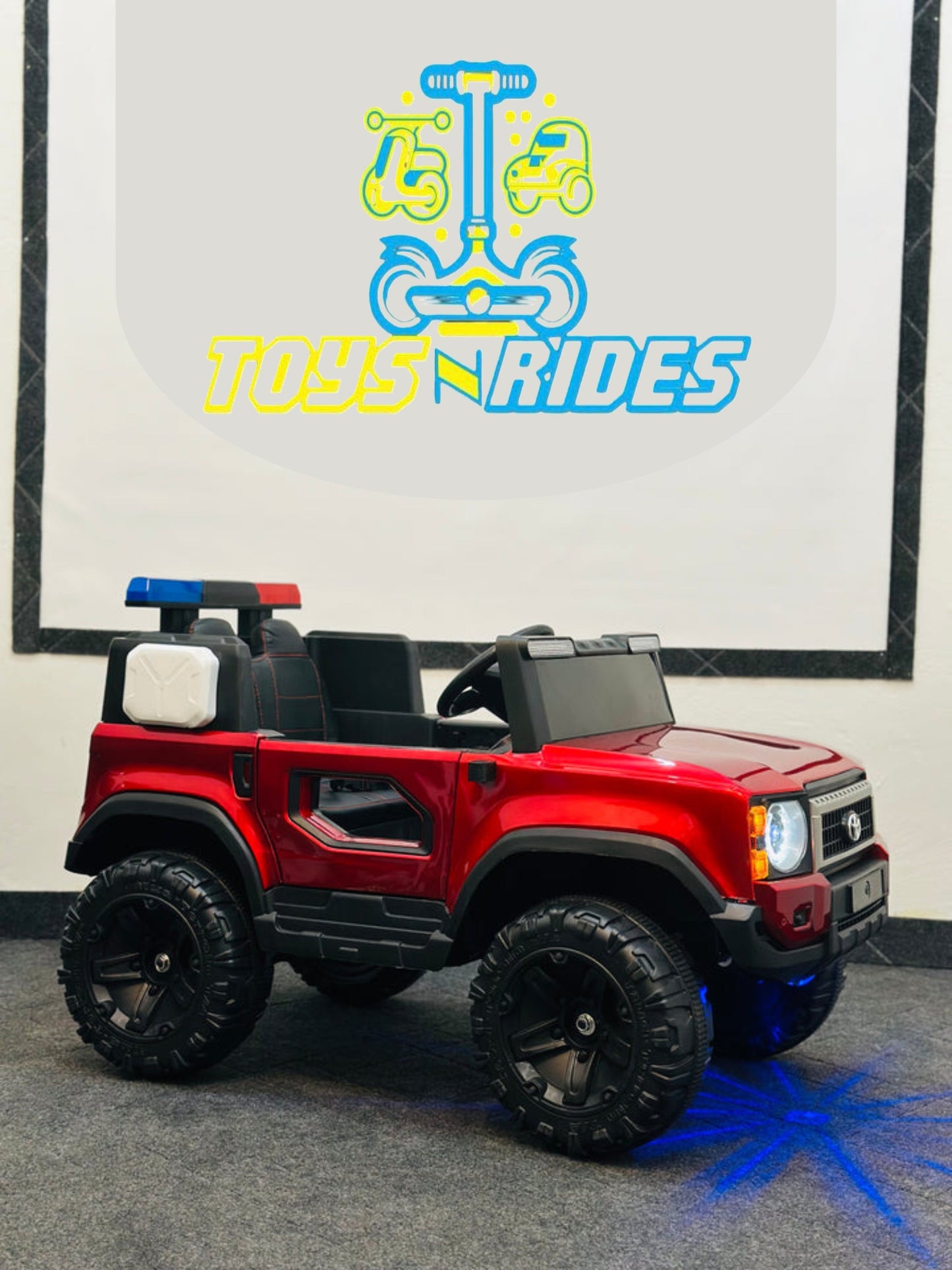 Close-up of the remote control and battery-operated features of the 4WD off-road jeep – 2025 FJ Cruiser (Model: TOYSNRIDES-4WD2025).