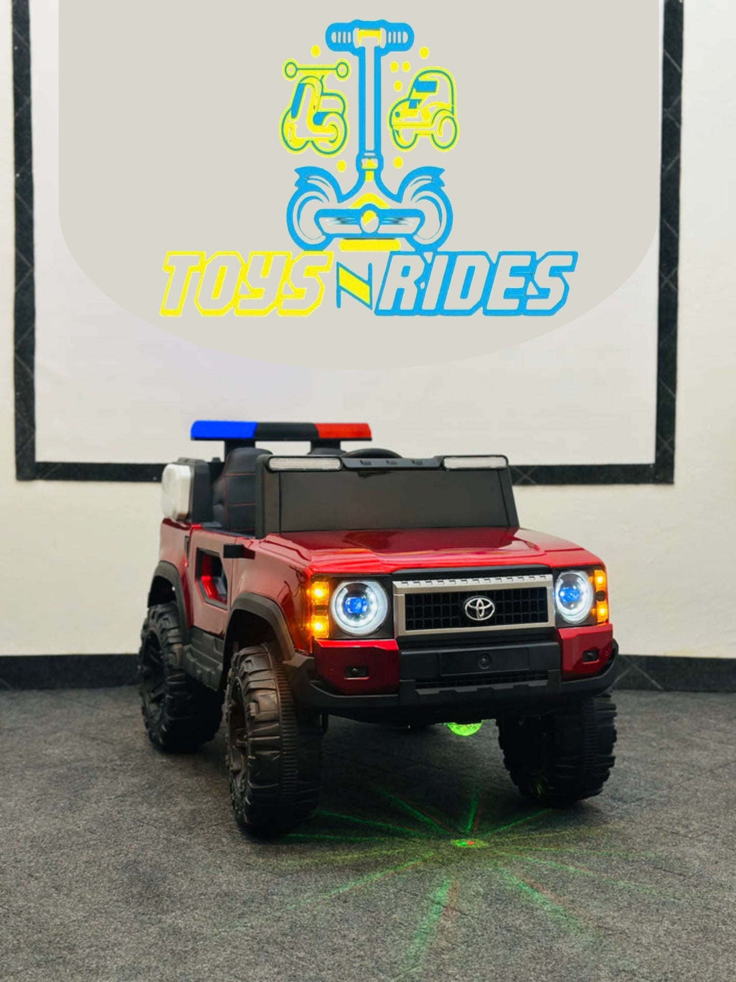 Kids enjoying the battery-operated 4WD jeep – 2025 FJ Cruiser (Model: TOYSNRIDES-4WD2025) on grass, with easy-to-use remote control.