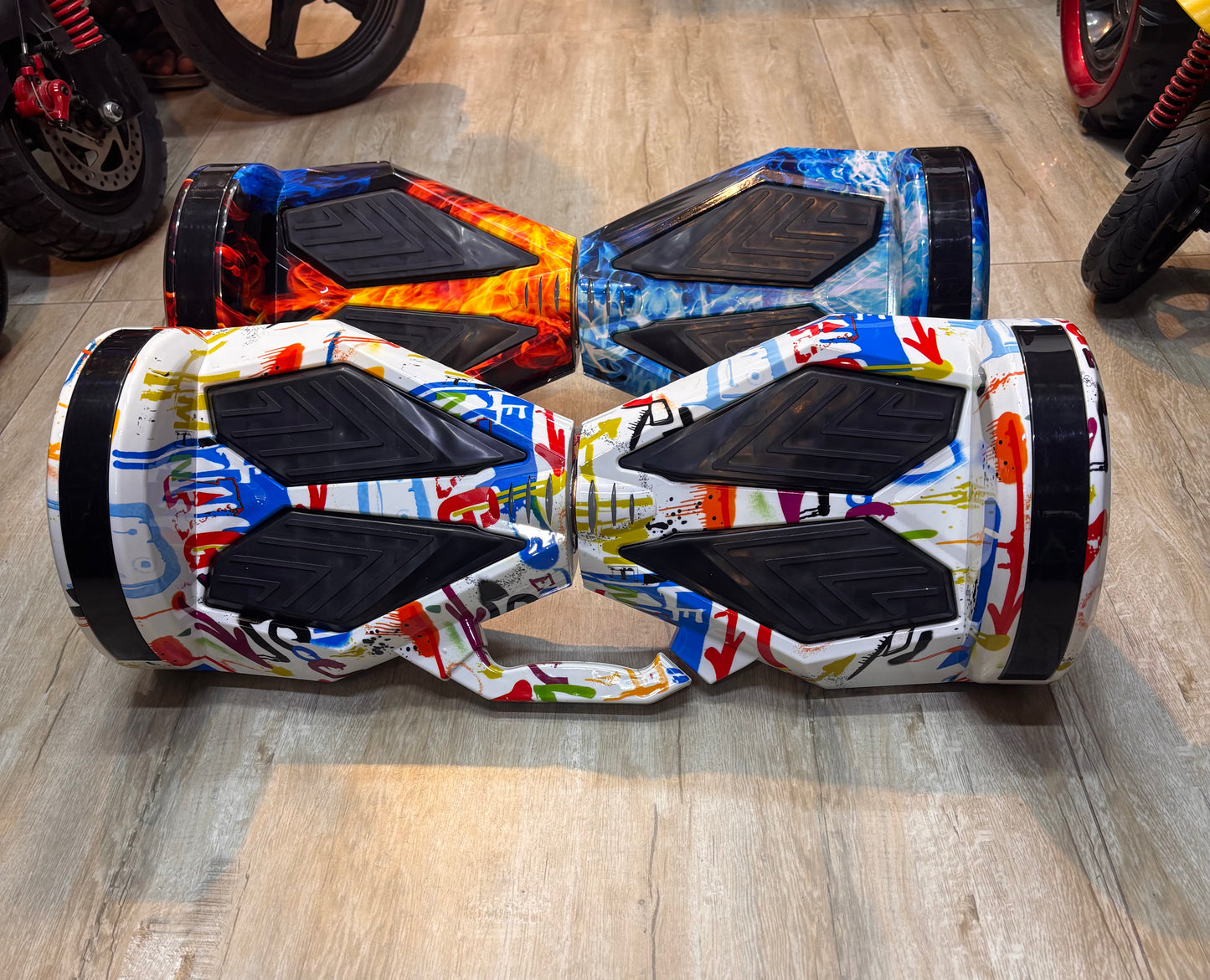 Stylish TOYSNRIDES hoverboard in multiple colors, perfect for gifting.