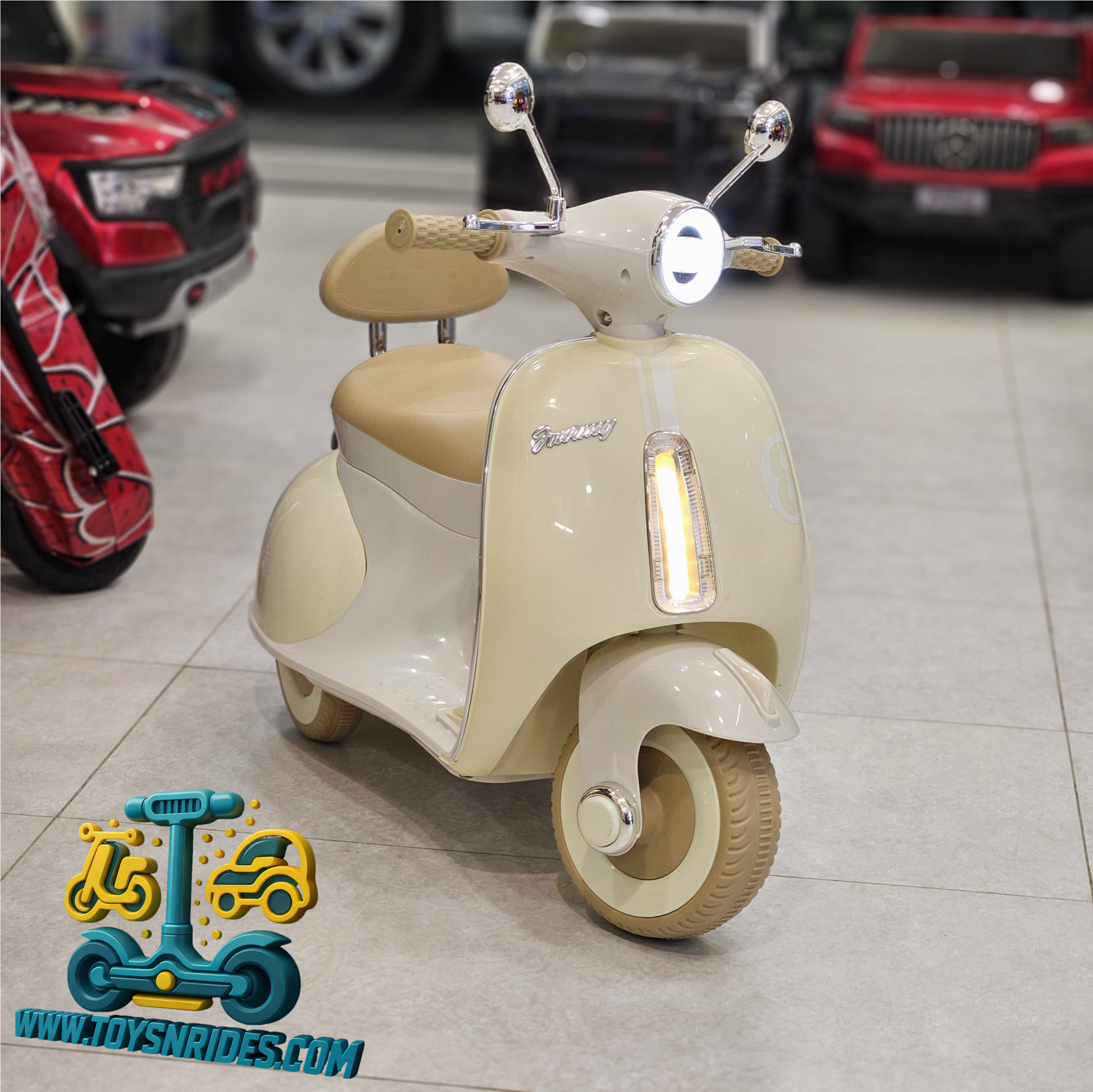Children's toy scooter with a vintage design in a showroom setting.