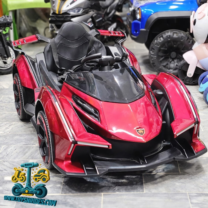 Red toy car with black interior on a tiled floor, brand logo visible