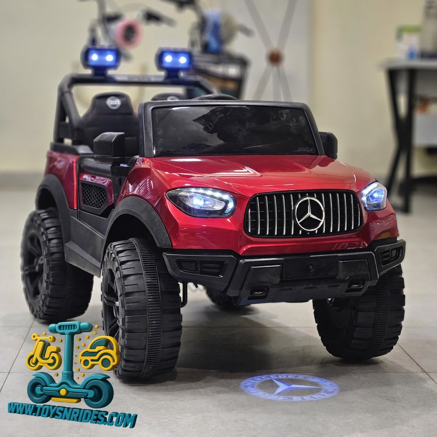 Red toy Mercedes-Benz truck with black wheels on a tiled floor, brand logo visible.