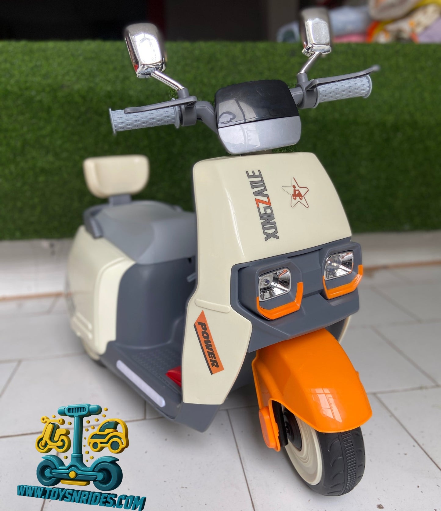 Kids 6V battery operated scooter bike beige orange ride on toy with LED lights and stable wheels for children